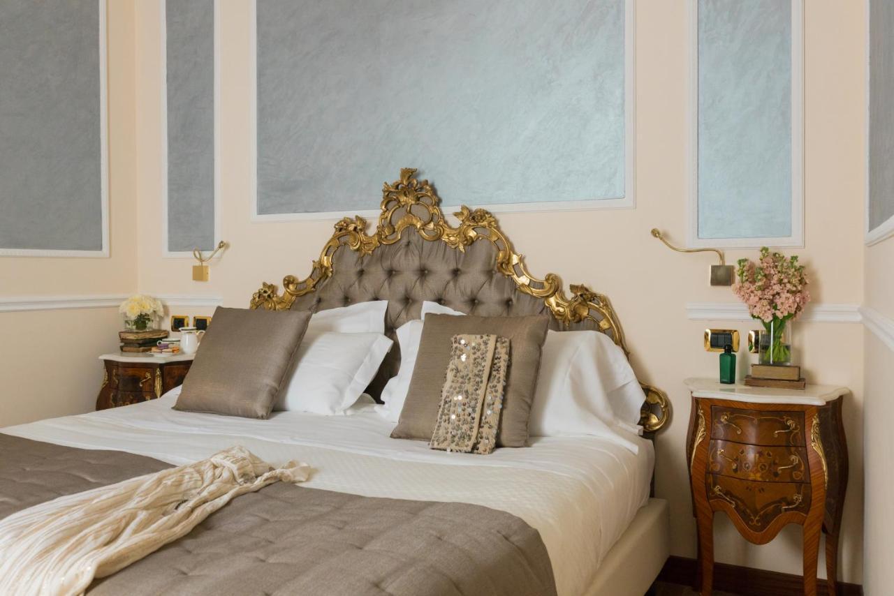 Hotel Bernini Palace Флоренція Екстер'єр фото A bedroom at the hotel